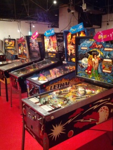 a row of pinball tables