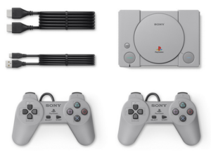 Playstation clasic with two controllers and cables.